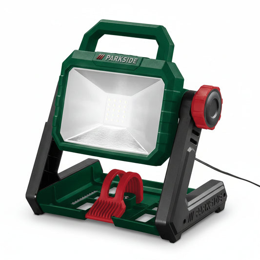 Portable work light with green and red design on a white background