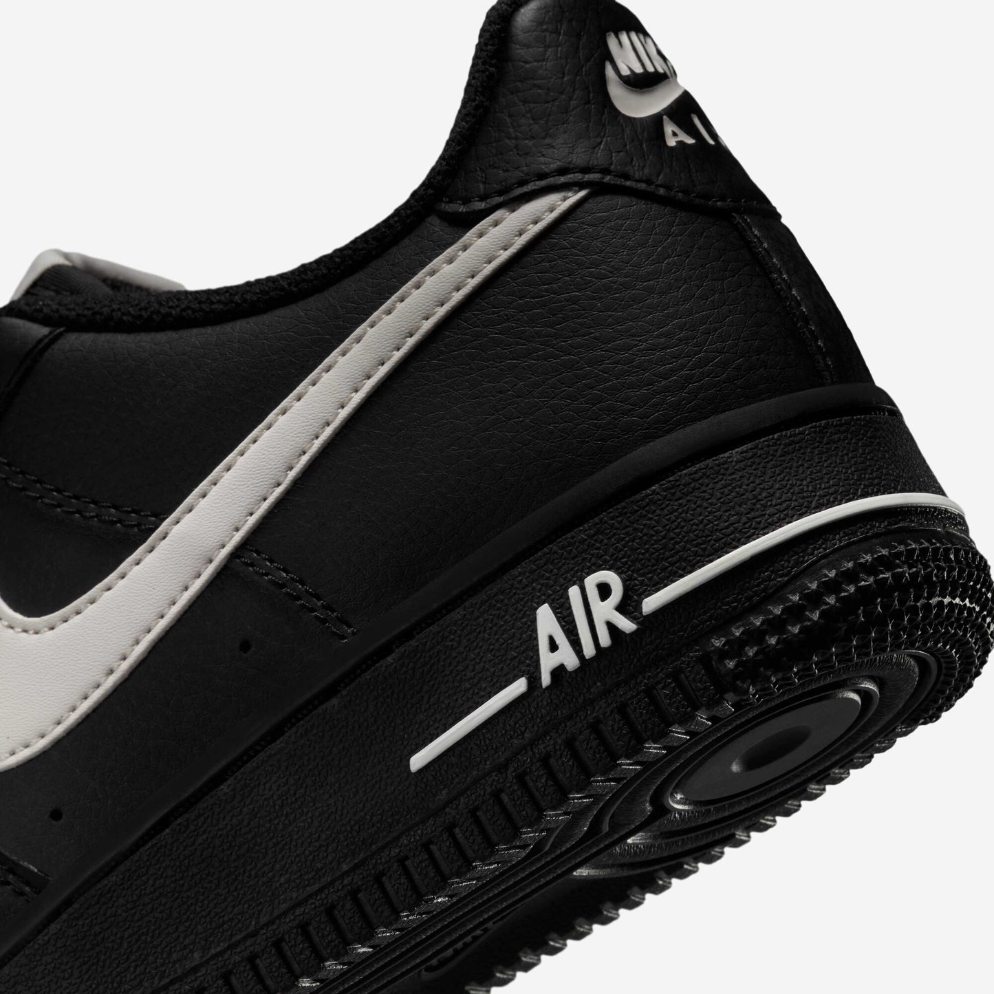 Nike Air Force 1 Older Kids' Iconic Black Leather Sneakers with Red Accents
