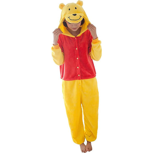 Person wearing a red and yellow onesie with bear ears and a smiling face.