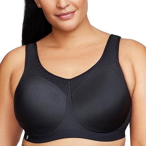 Woman wearing a black wireless bra on a white background