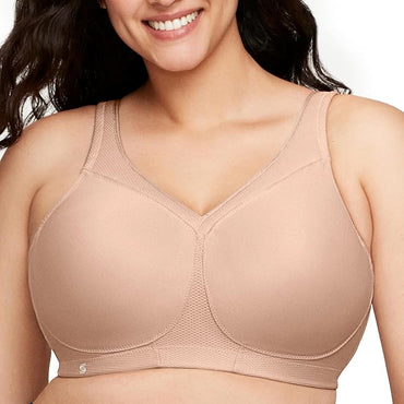 Woman wearing a beige bra on a white background