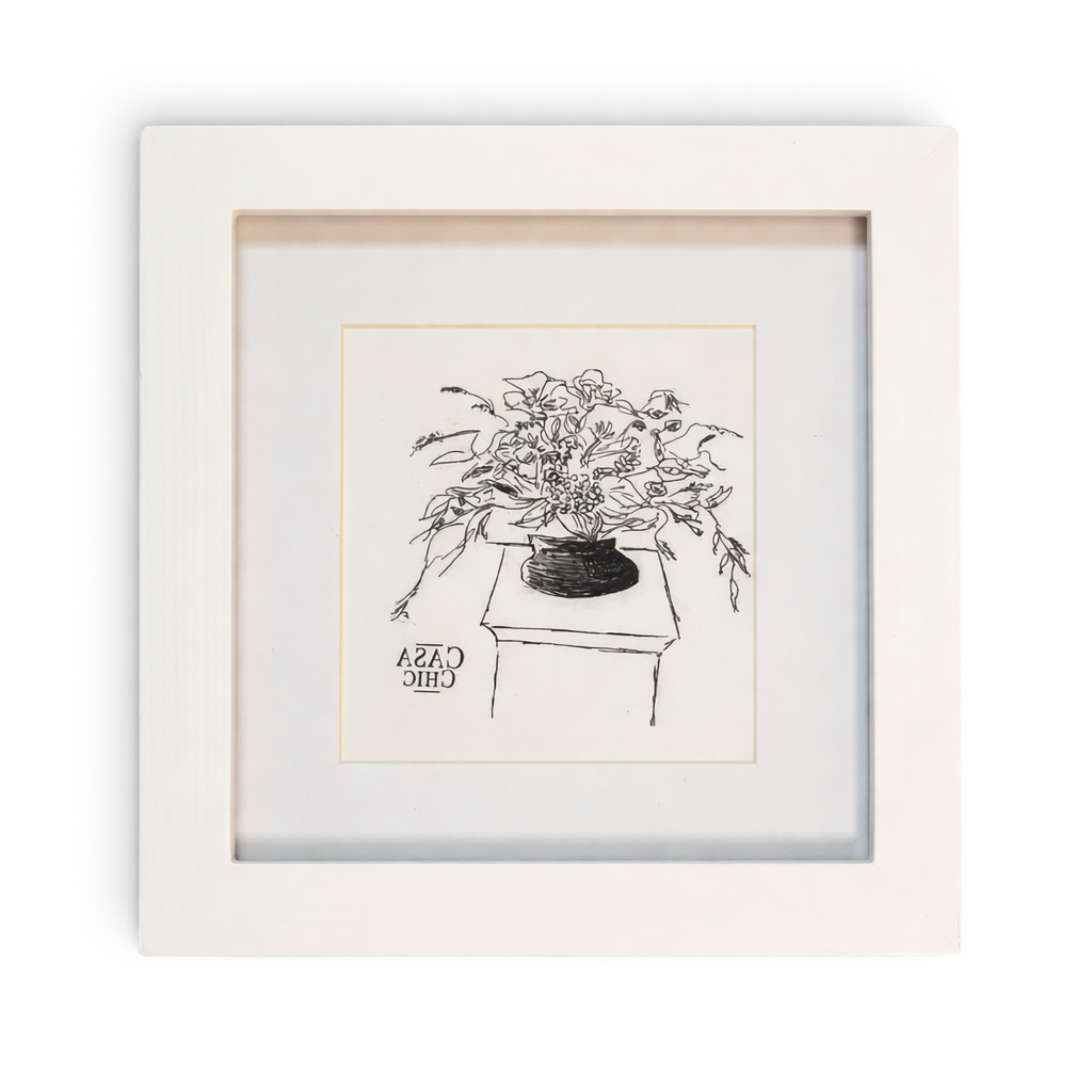 Casa Chic - a white wooden picture frame with a minimalist black-and-white sketch inside