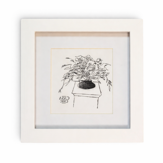 Casa Chic - a white wooden picture frame with a minimalist black-and-white sketch inside