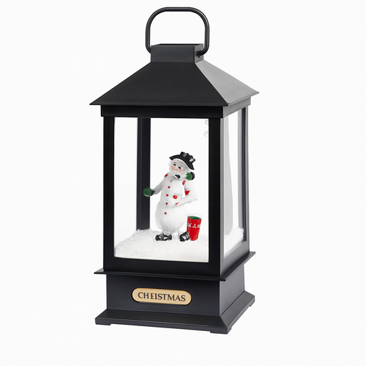 Black lantern with a snowman inside, featuring the word 'Christmas'.
