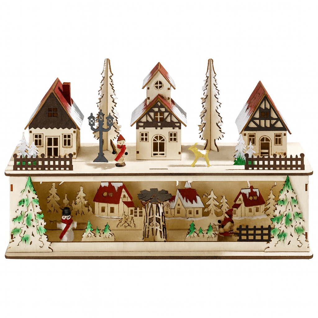 Wooden Christmas village scene with houses, trees, and figures on a white background