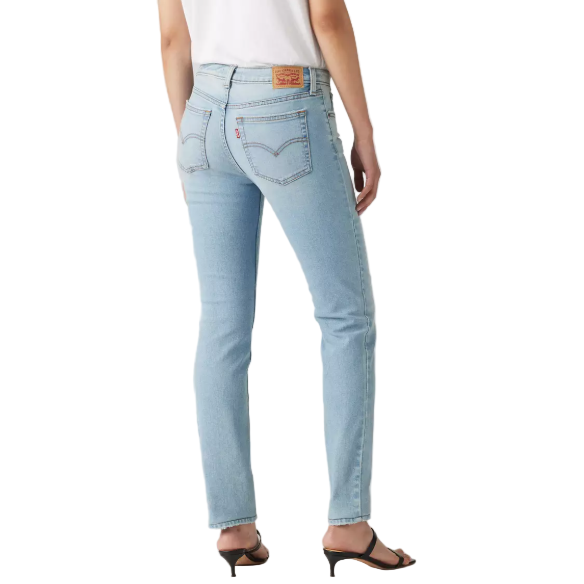 Light blue jeans worn by a person on a plain background