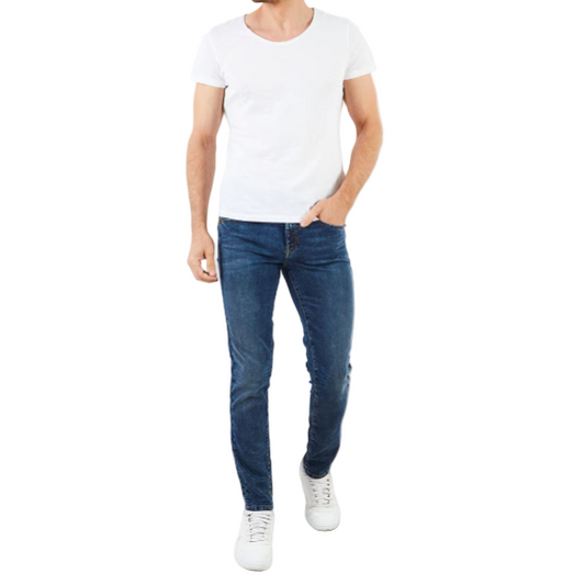 Person wearing a white t-shirt, blue jeans, and white sneakers on a white background