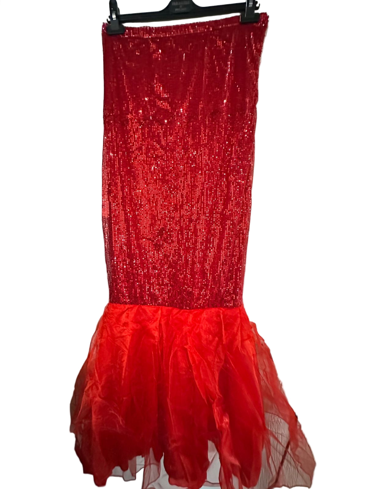 Red Cut Dress on a hanger against a white wall.