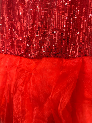 Close-up of a red sequin dress