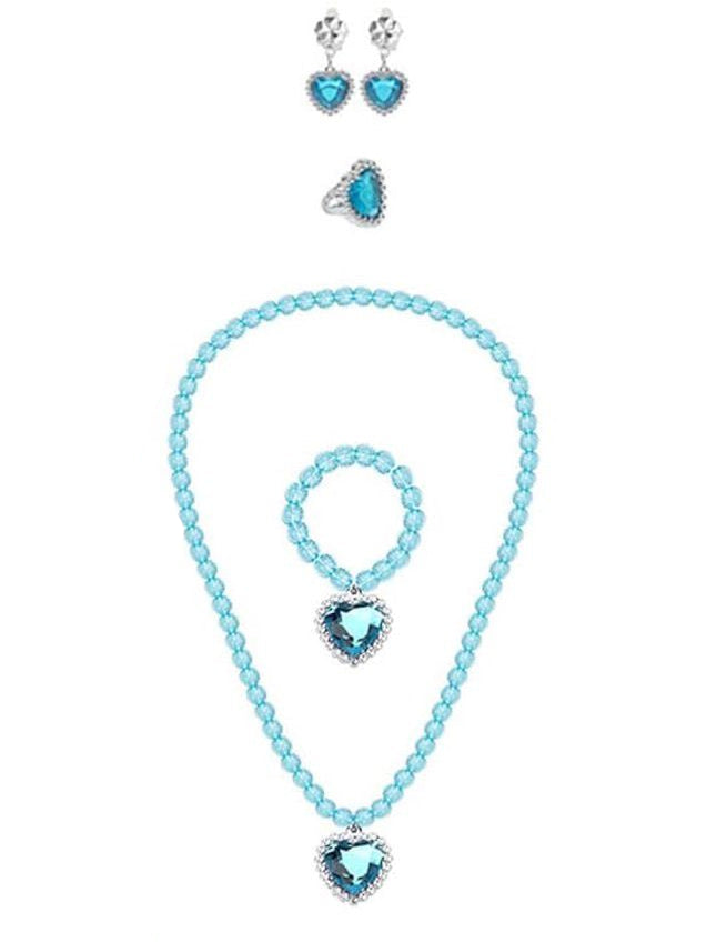 Collection of Frozen-themed accessories including a tiara, gloves, necklace, bracelet, earrings, and hair extensions on a white background.
