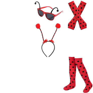 Child in ladybug costume with matching accessories on a white background