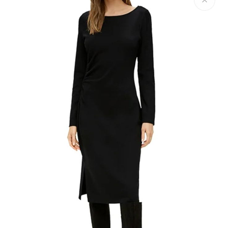 Black dress displayed on a model with a website interface in the background