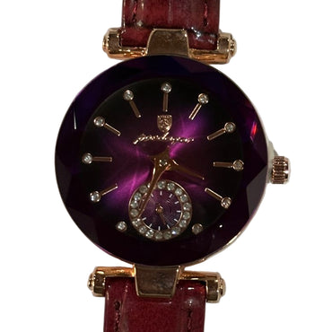 Watch with a purple face and red strap on a white background