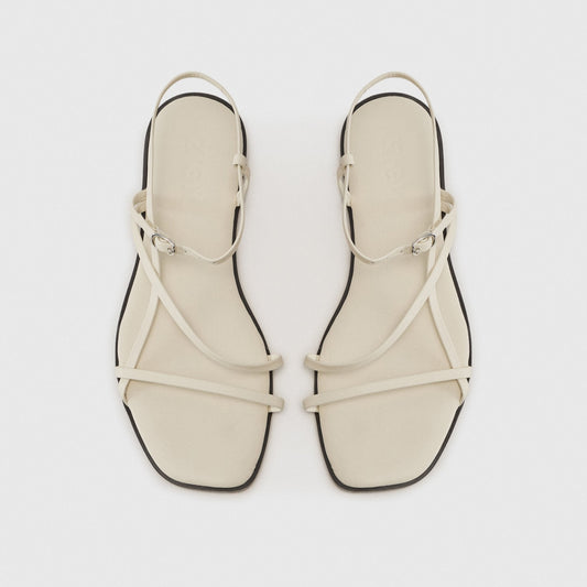 Zign Women's Off-White Leather Flat Strappy Sandals with Adjustable Buckle Chic - Gomix Brands Outlet