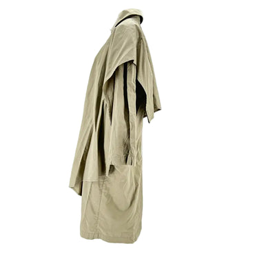 Beige trench coat on a mannequin against a white background