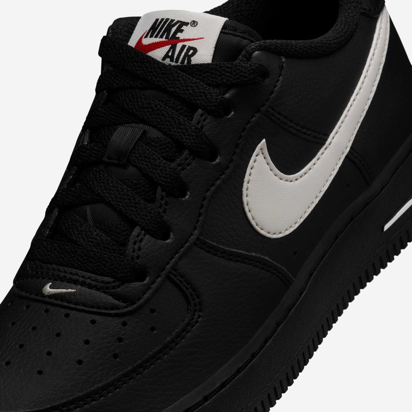 Nike Air Force 1 Older Kids' Iconic Black Leather Sneakers with Red Accents