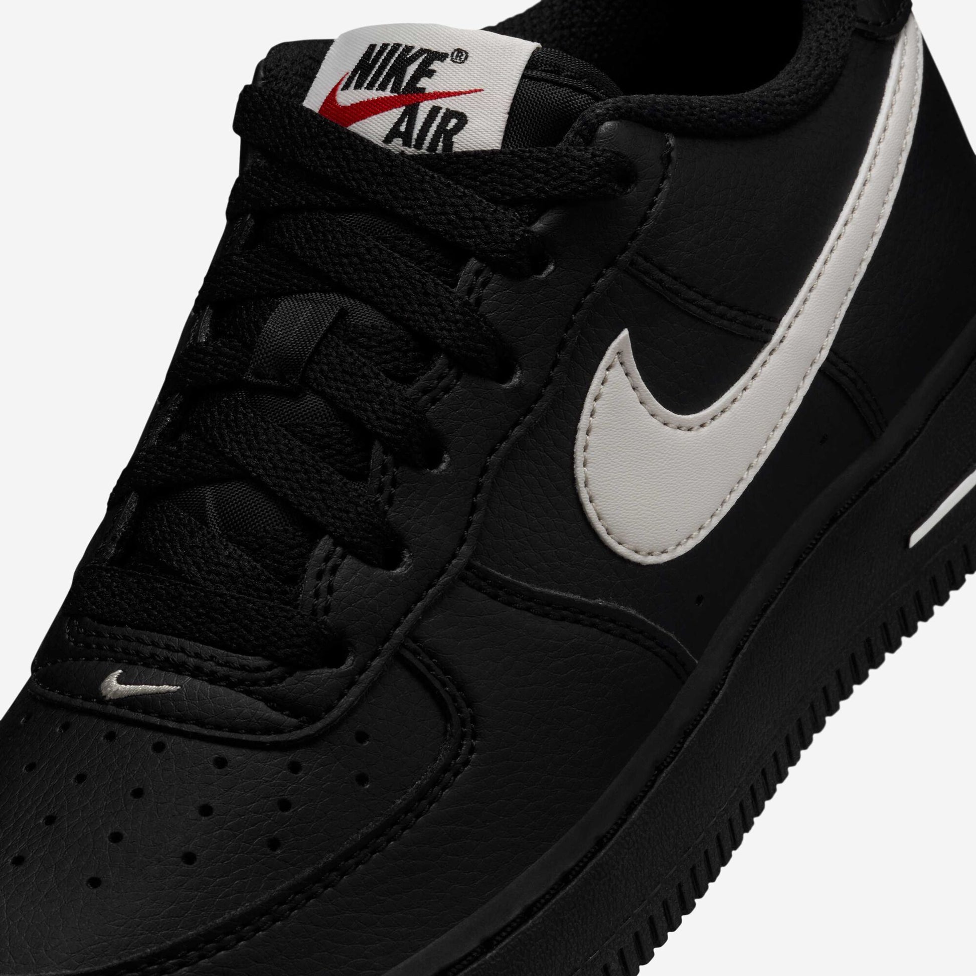 Nike Air Force 1 Older Kids' Iconic Black Leather Sneakers with Red Accents