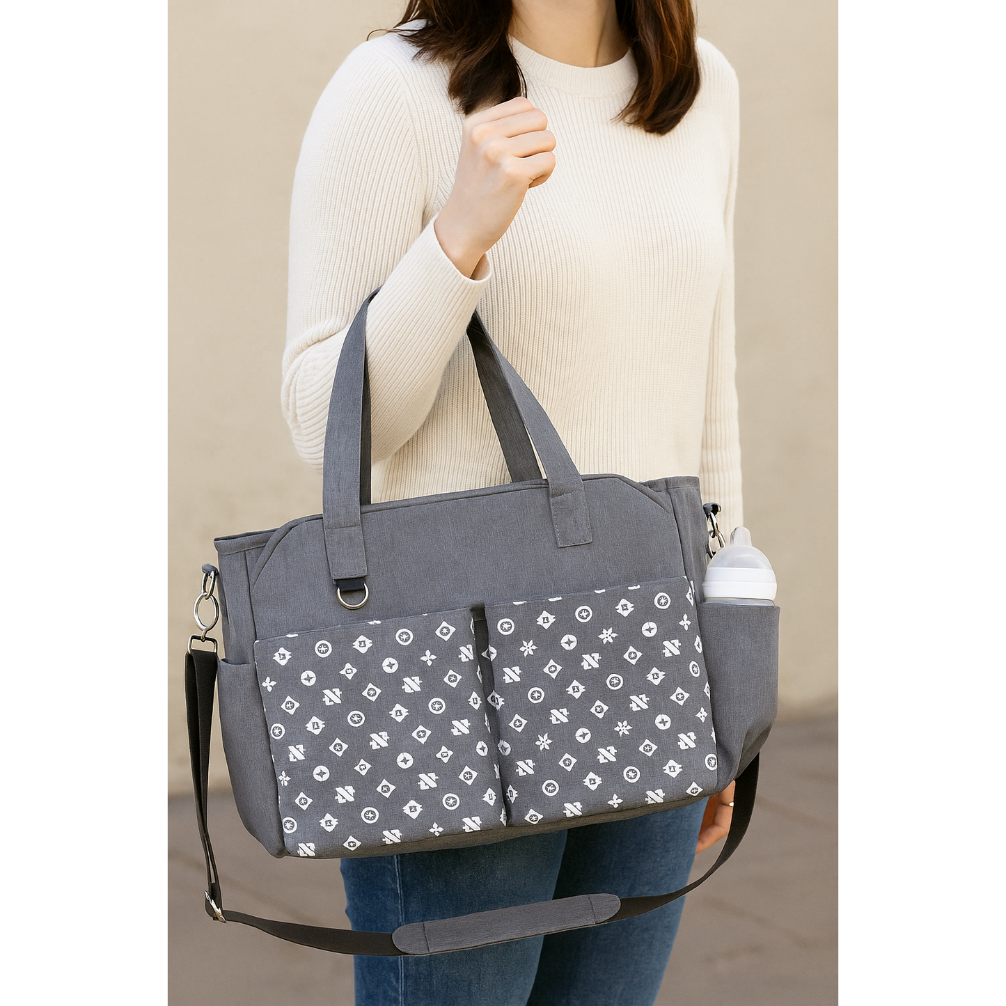 Versatile Grey Baby Stroller Travel Bag with Multiple Pockets.