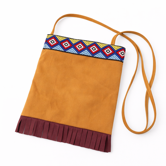 Bohemian Vibes: Suede Crossbody Bag with Geometric Trim