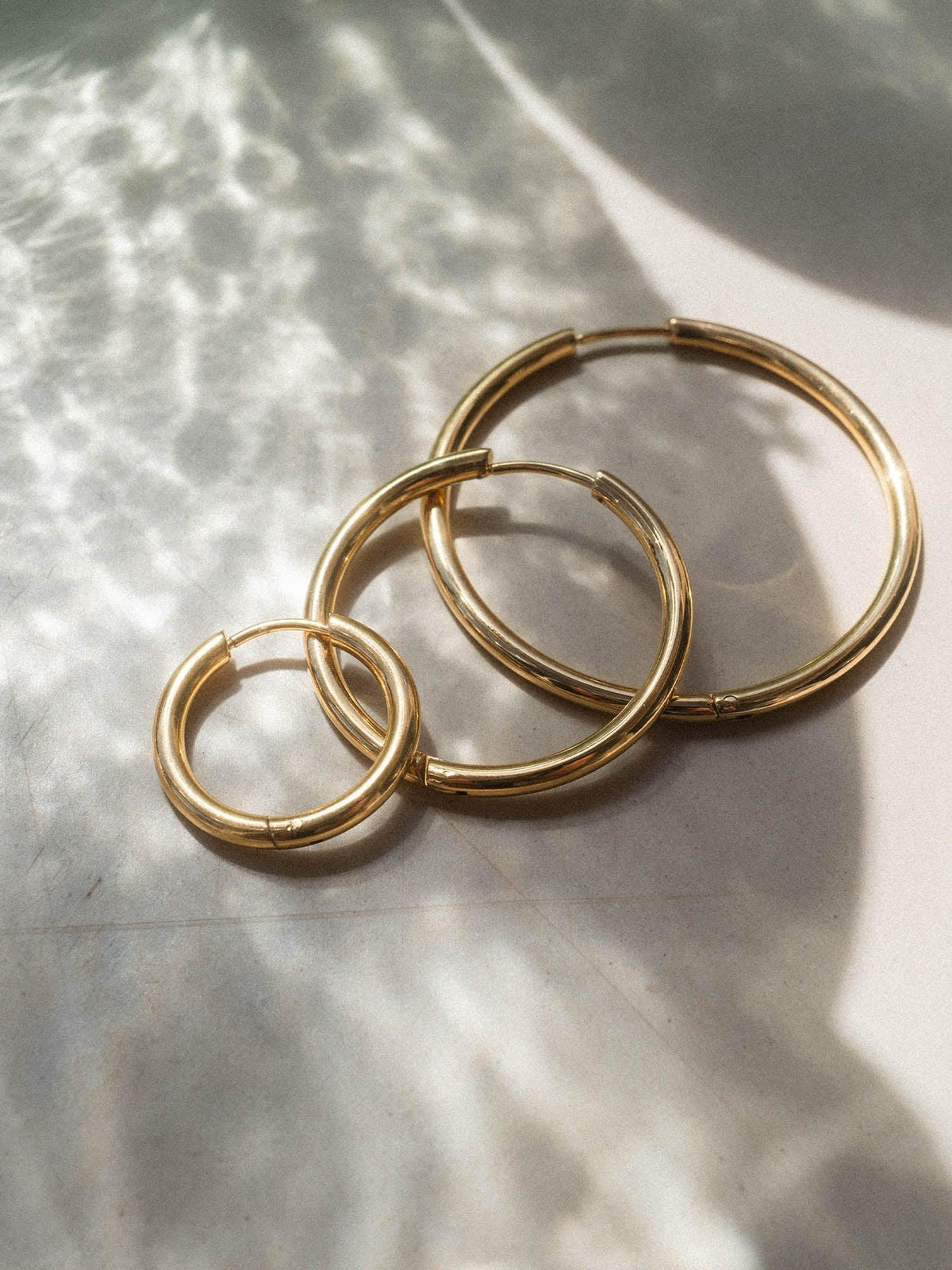 Elegant Echo Earring Set: Waterproof Stainless Steel Hoops & Studs - Gomix Brands Outlet
