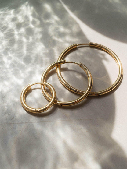 Elegant Echo Earring Set: Waterproof Stainless Steel Hoops & Studs - Gomix Brands Outlet