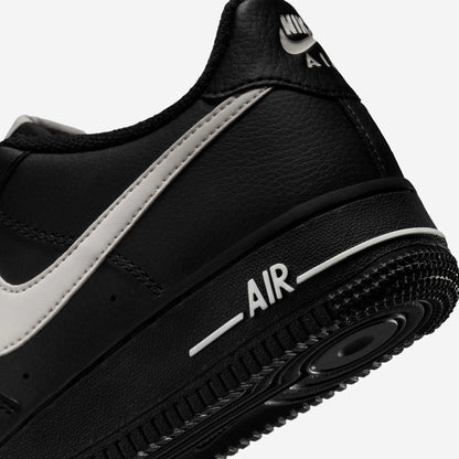 Nike Air Force 1 Older Kids' Iconic Black Leather Sneakers with Red Accents