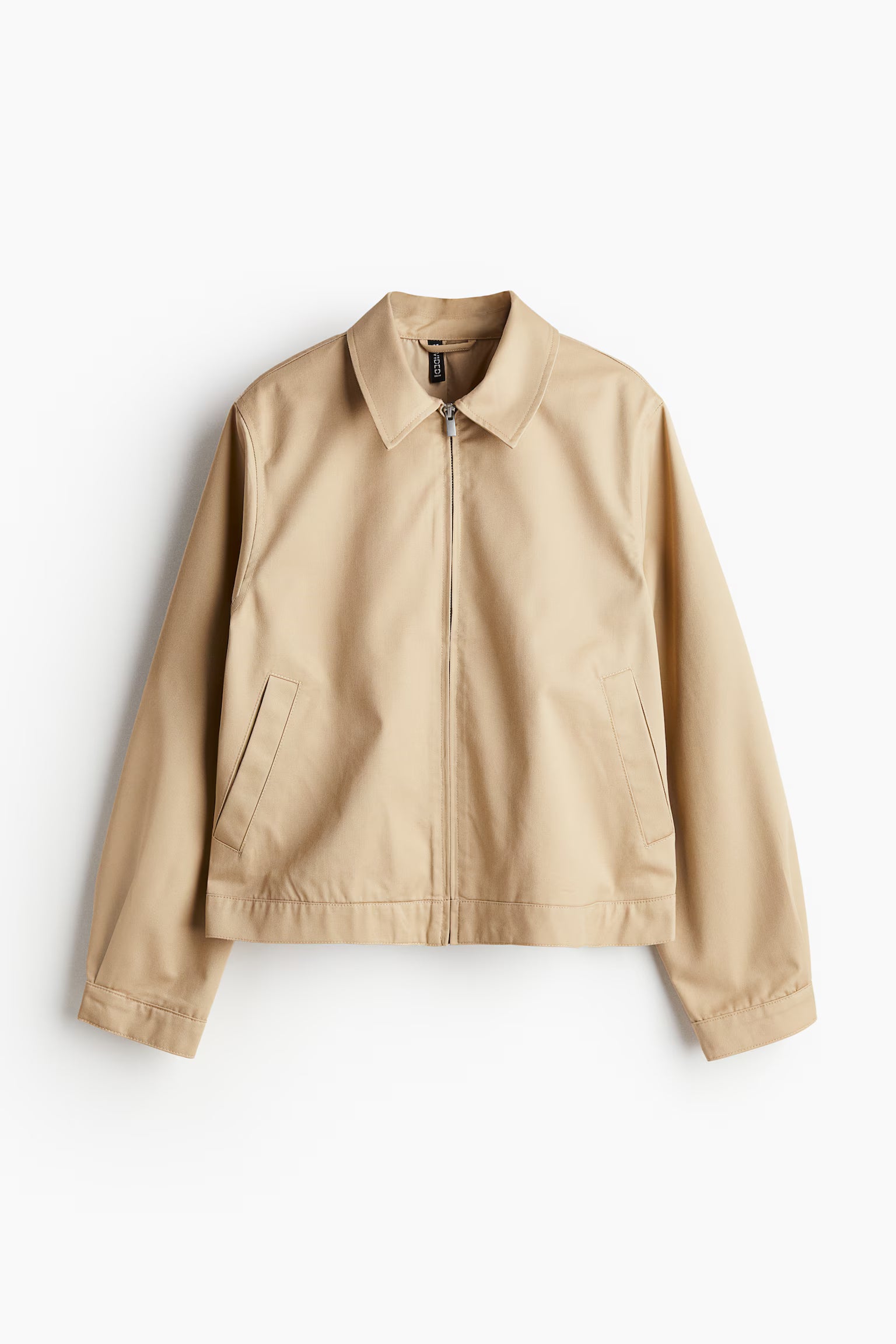 Beige jacket on a white background