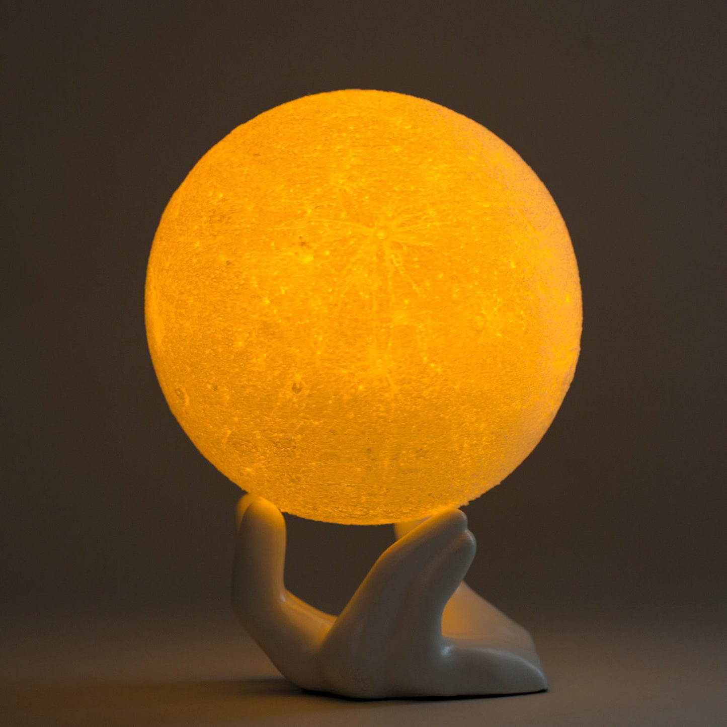https://www.fnp.com/images/pr/x/v20210505164159/3d-printed-moon-in-the-palm-table-lamp_1.jpg