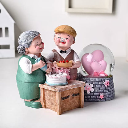 Floweraura LED Snowglobe Old Couple Figurine – Romantic Home Décor
