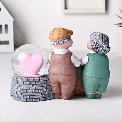 Floweraura LED Snowglobe Old Couple Figurine – Romantic Home Décor
