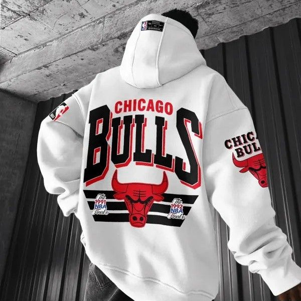 White hoodie with Chicago Bulls logo on a gray background