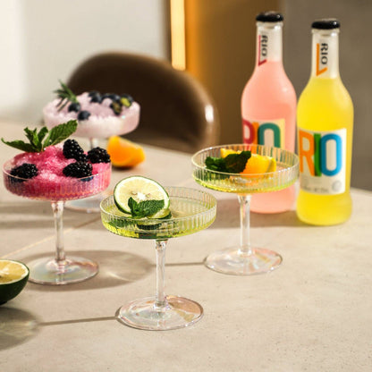 Iridescent Rainbow Coupe Glasses Set of Four – Hand‑Blown Cocktailware