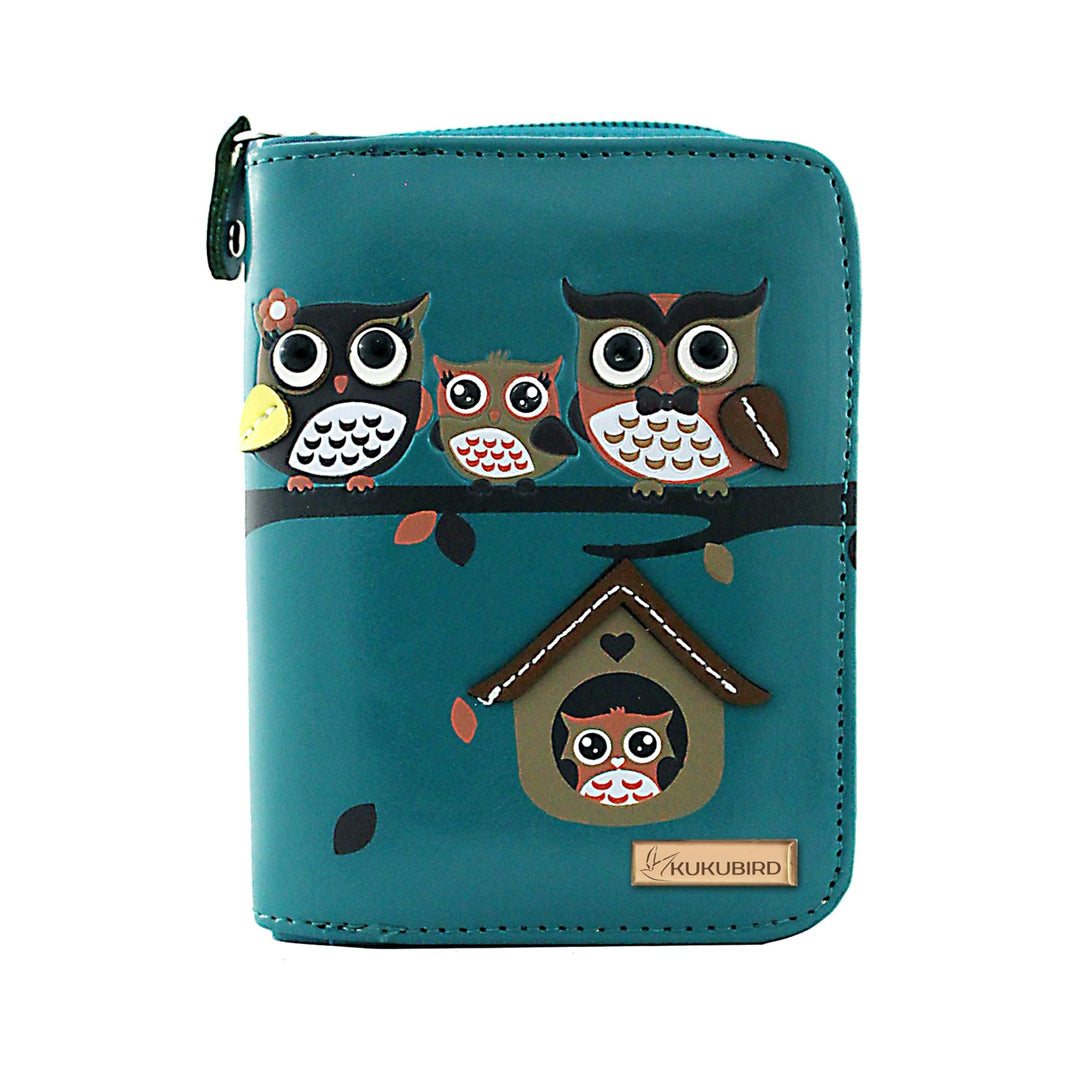 Teal wallet with owl designs on a white background