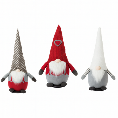Three decorative gnomes with different hats and outfits on a white background