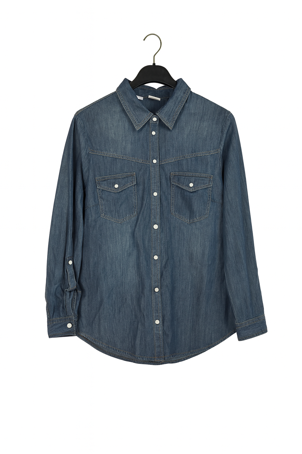 Blue denim shirt on a hanger against a white background