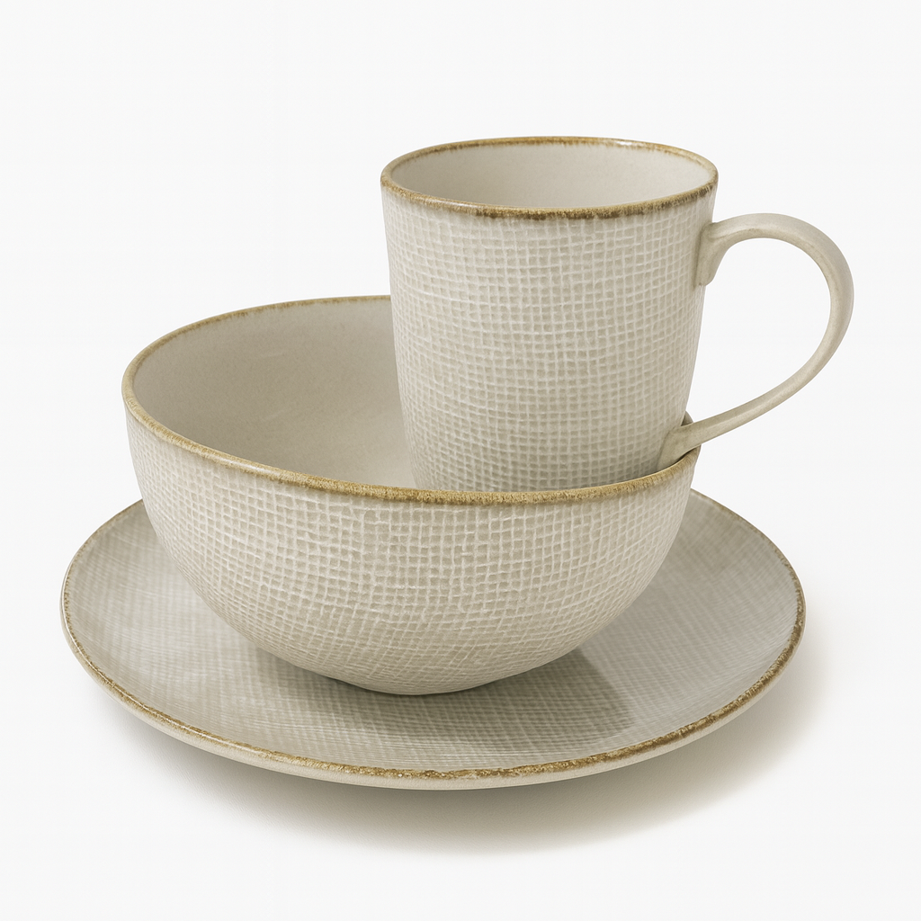Ceramic cup and saucer set with textured design on a white background