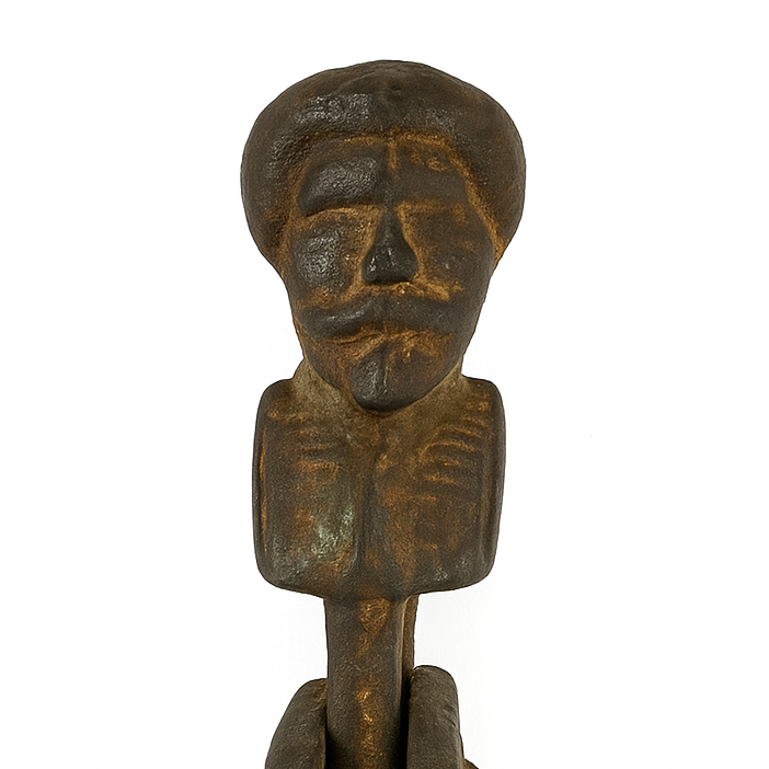 Bronze figurine of a standing figure on a white background