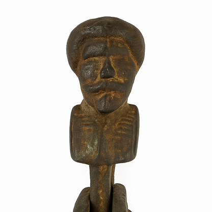 Bronze figurine of a standing figure on a white background