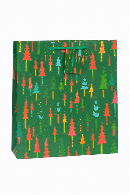 Gift bag with colorful Christmas tree pattern on a green background