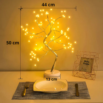 https://cdn.shopify.com/s/files/1/0633/6905/2238/files/Lampara-Decorativa-Bonsai-Dorado-Claro-compra-online-en-Quito.webp?v=1740753706