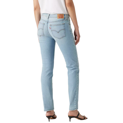 Light blue jeans worn by a person on a plain background