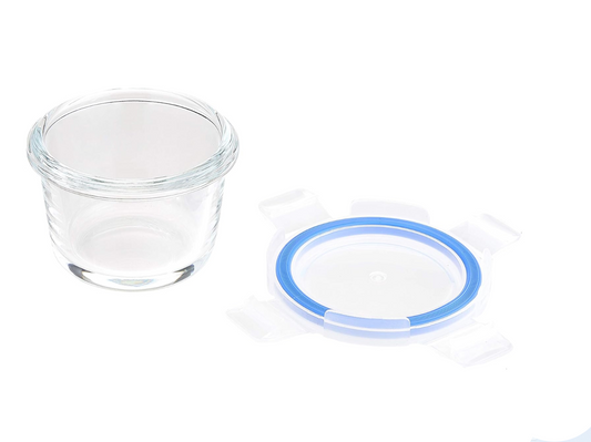 Glass container with a lid on a white background
