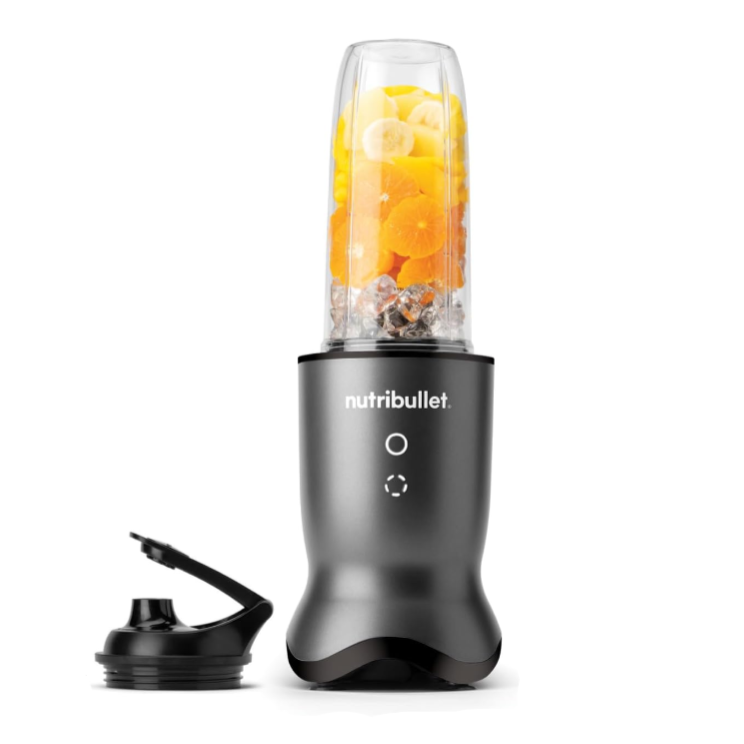 Nutribullet blender with a clear container filled with orange liquid on a white background