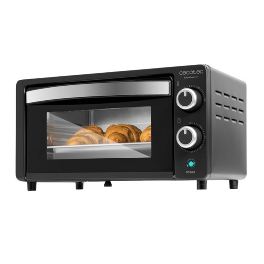 Black toaster oven with bread inside on a white screen