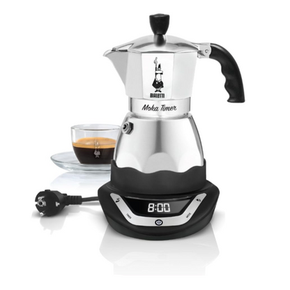 Electric coffee maker with a glass carafe and digital display on a white background