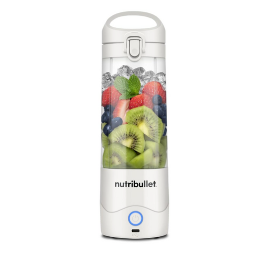 Nutribullet blender with fruits on a white page