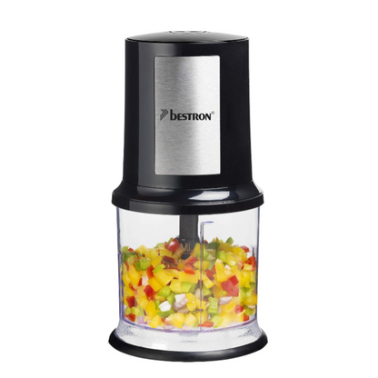 Bestron food chopper with chopped vegetables on a black background