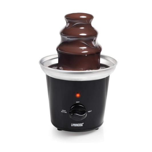 Chocolate fountain with flowing chocolate on a white background