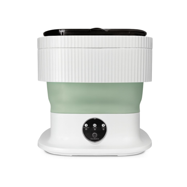 White and green portable washing machine a white background 