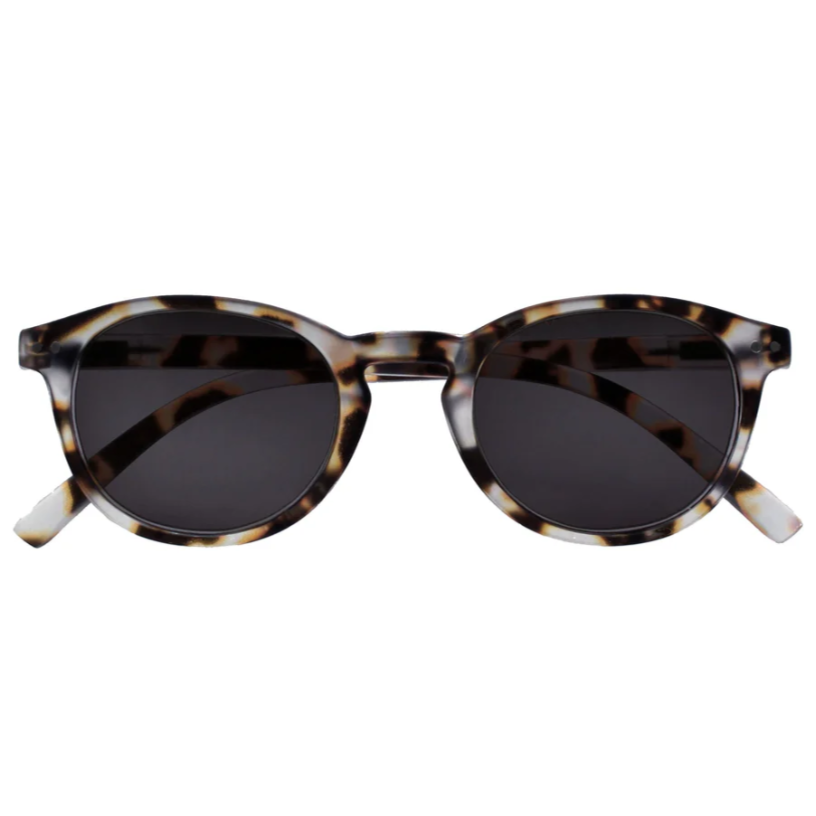 Sunglasses with tortoiseshell frame and dark lenses on a white background